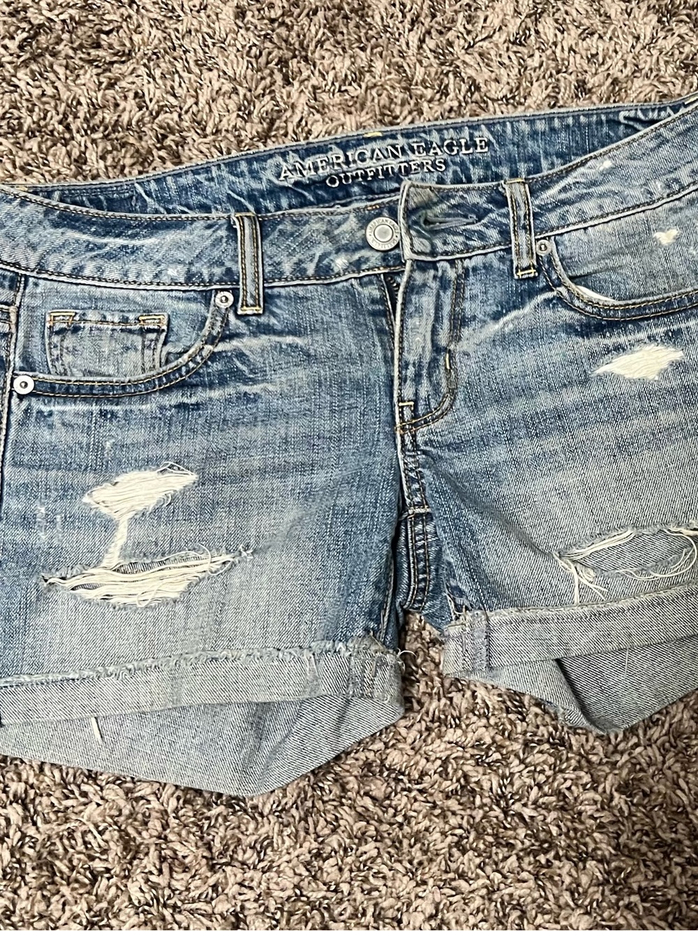 American Eagle Outfitters Light Blue Distressed Rolled Hem Jean Shorts - size 2